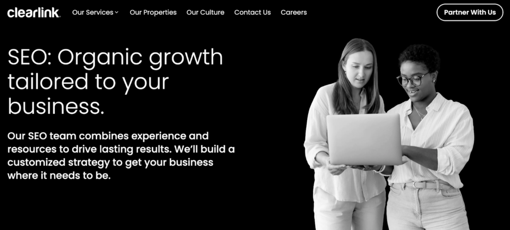 Clearlink SEO content agency homepage with two women with a laptop